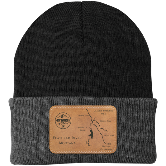 Black knit beanie with tan circular leather 49° North of Noise logo patch, Flathead River Edition.

