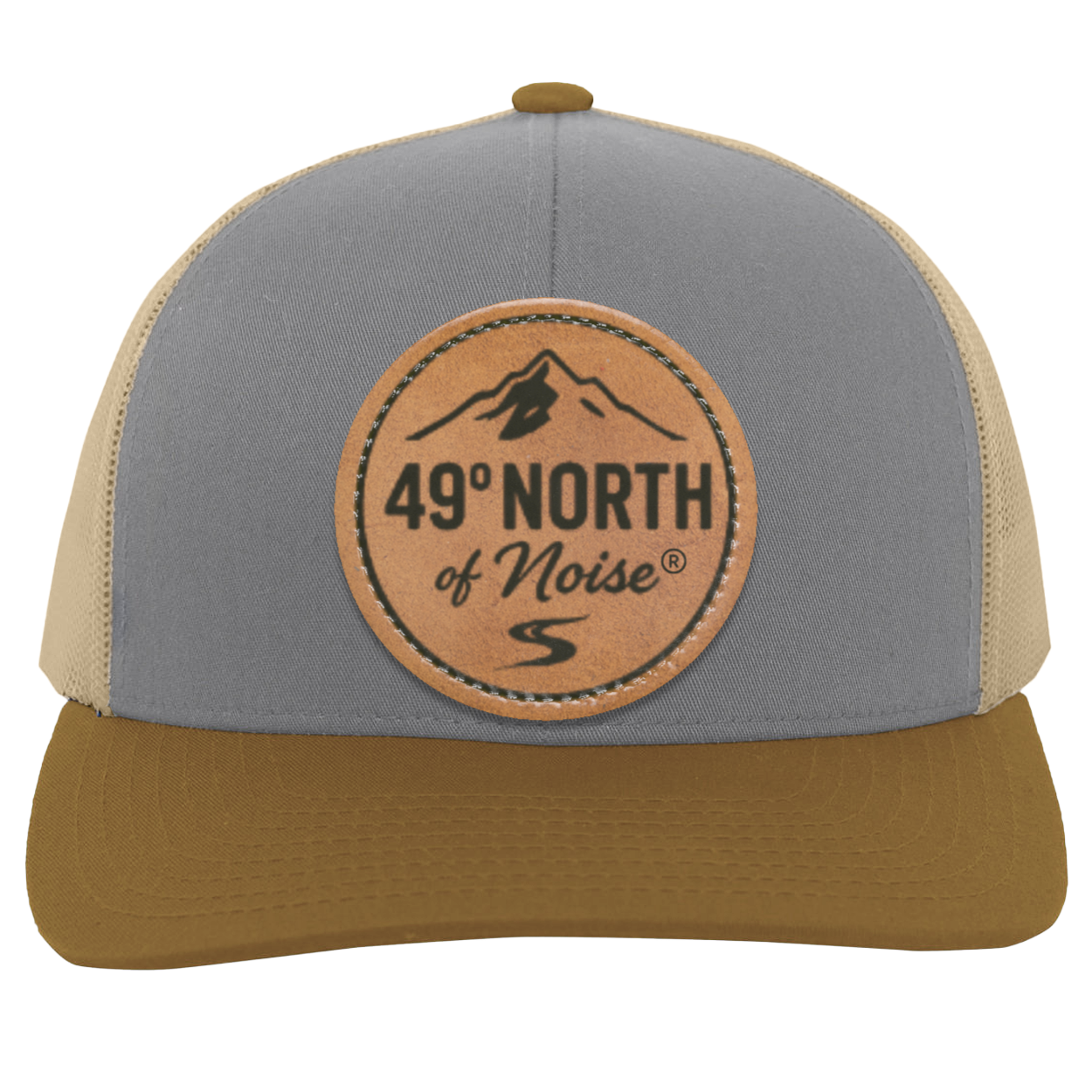 49° North trucker hat with Flathead River scout map leather patch – mid-profile cotton front and mesh back snapback, photographed outdoors on rustic wood table